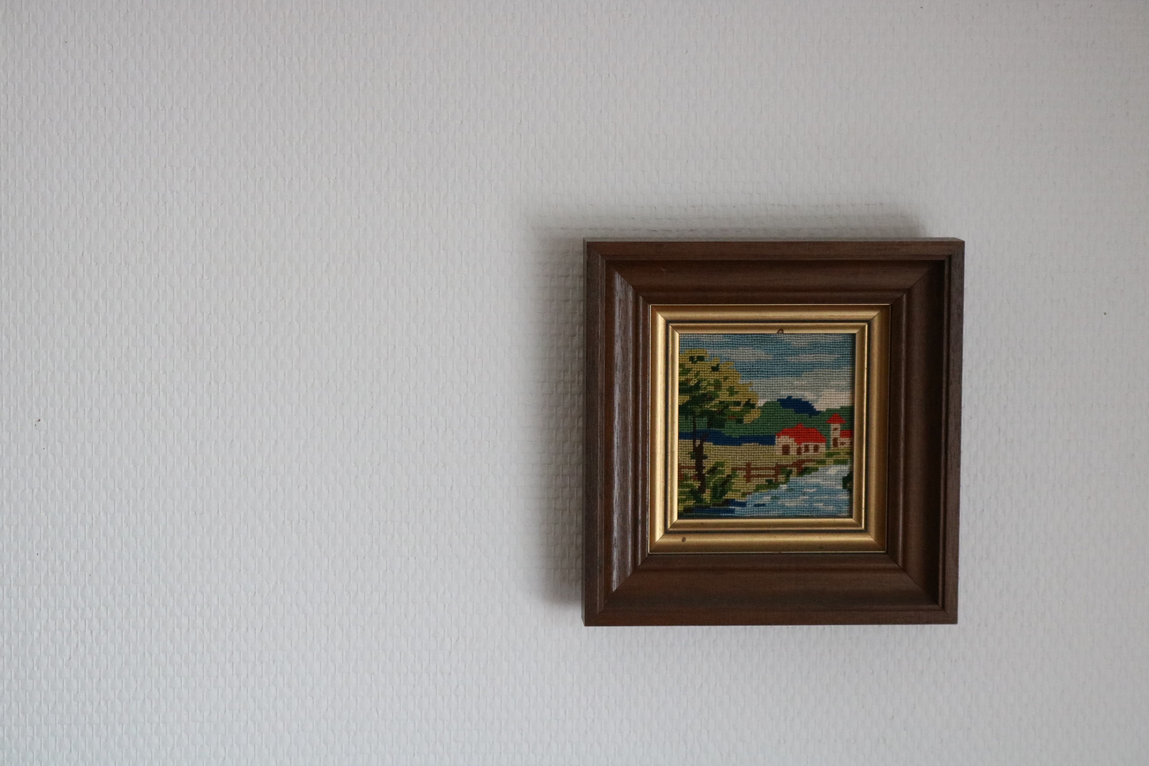 Small picture frame on a white wall